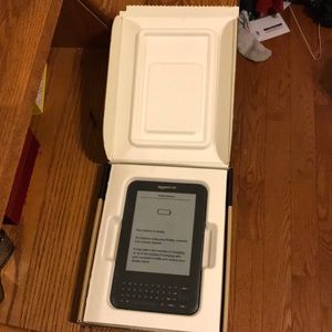 Amazon Kindle (NEVER used)